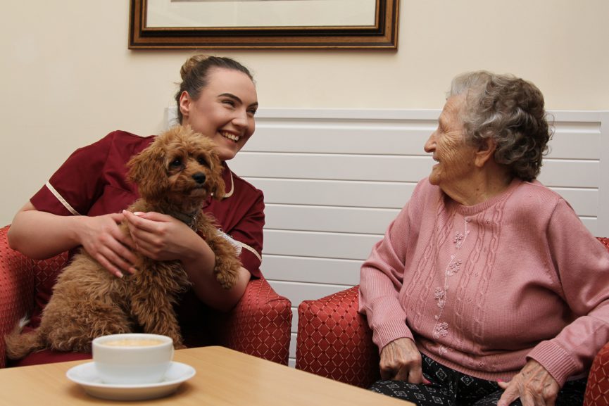 Carer Daphne the Dog and Resident